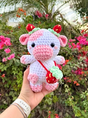 Vaca rosa con cerezas